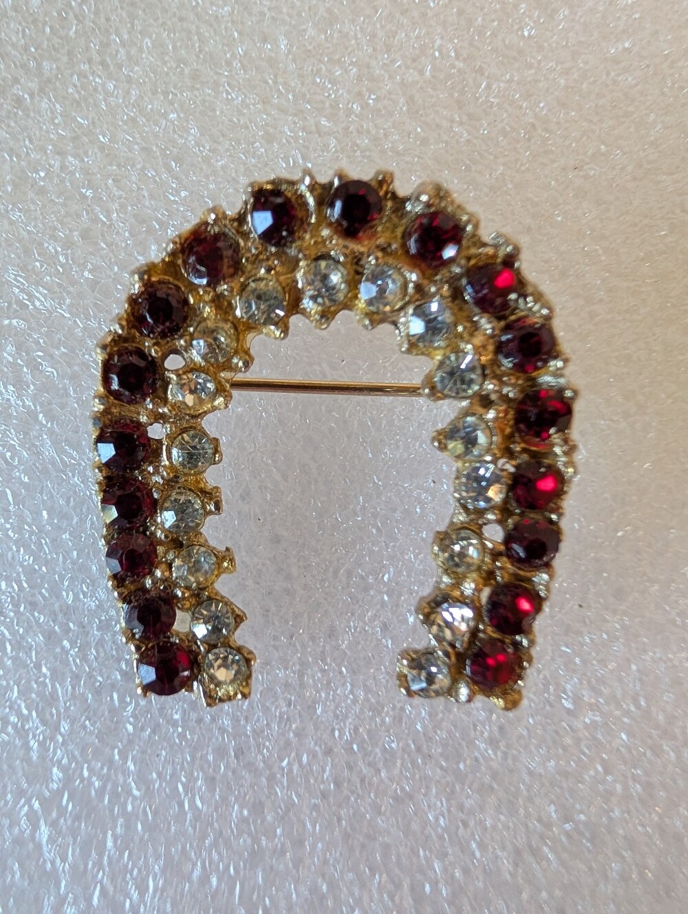 Gold Horseshoe Brooch with Red and Clear Crystals